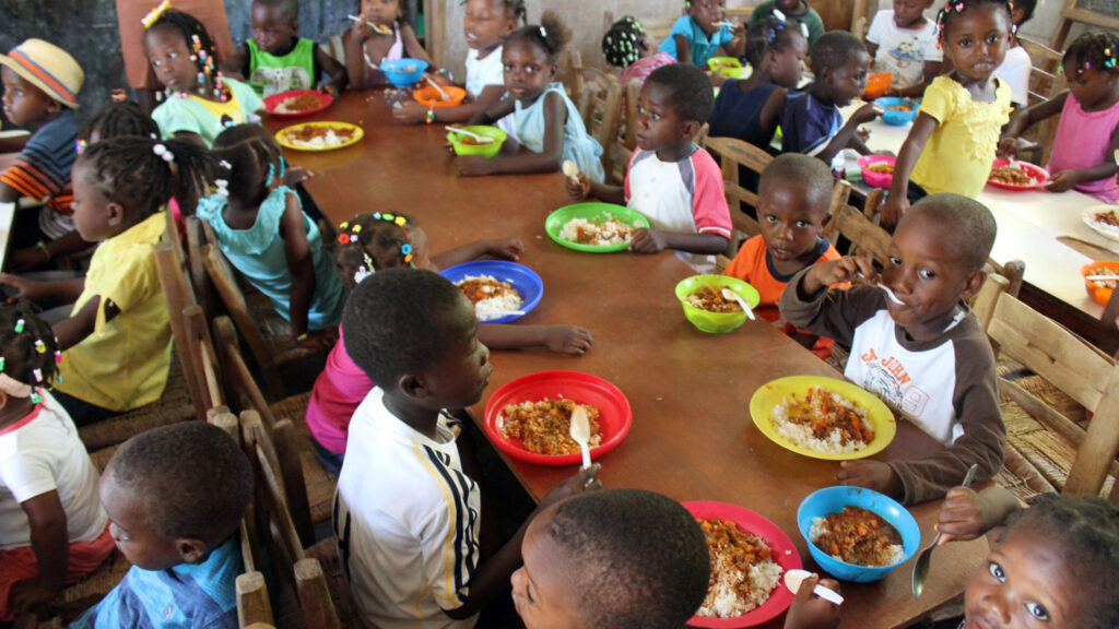 Children eat at a table